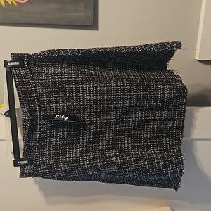 Lily by Firmiana skirt.